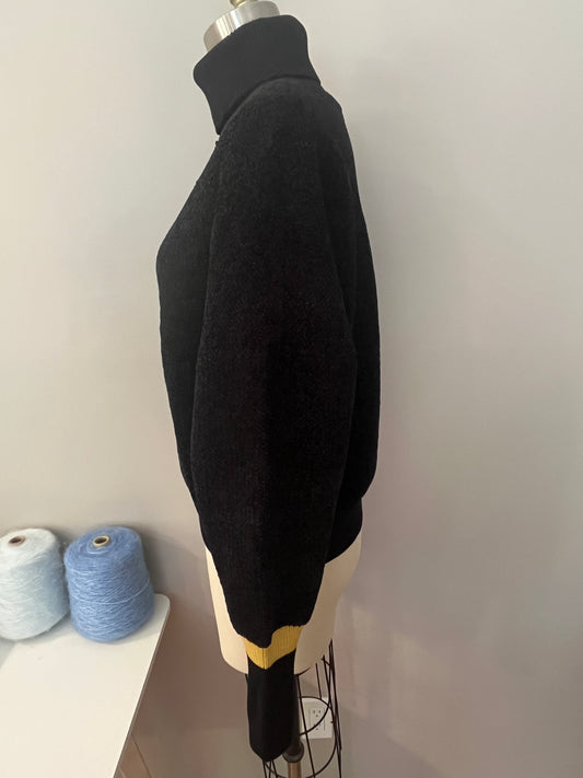 Black turtleneck sweater