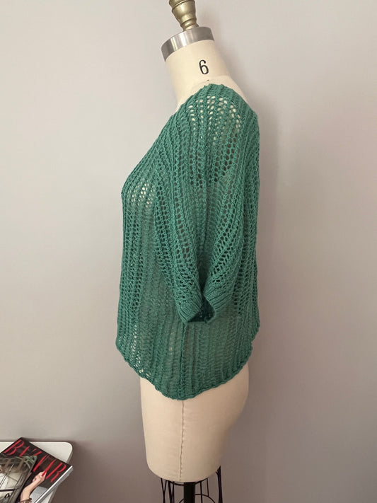 Green open-weave crochet knit top