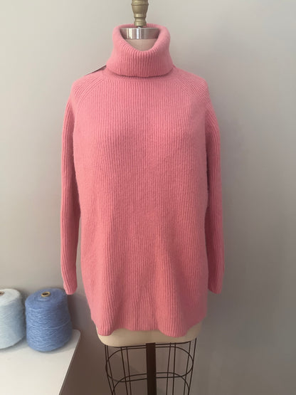 Pink turtleneck sweater