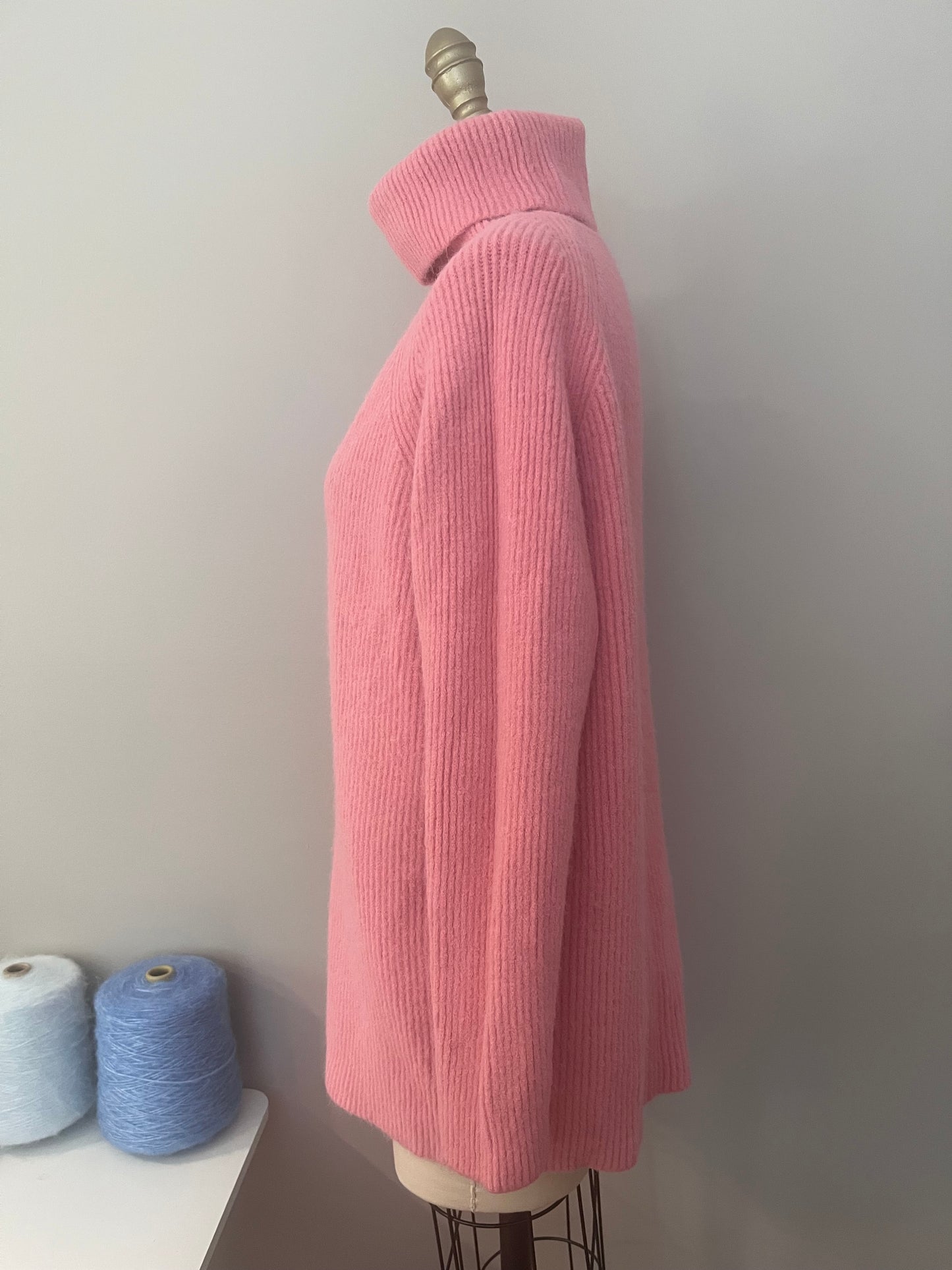 Pink turtleneck sweater