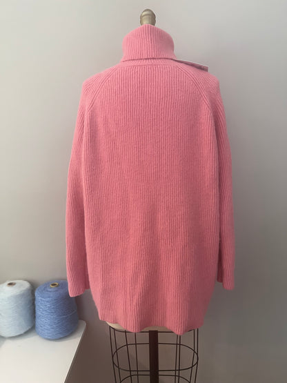 Pink turtleneck sweater