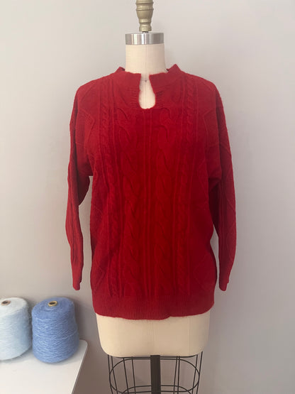 Red cable sweater