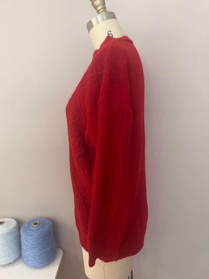 Red cable sweater