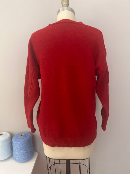 Red cable sweater