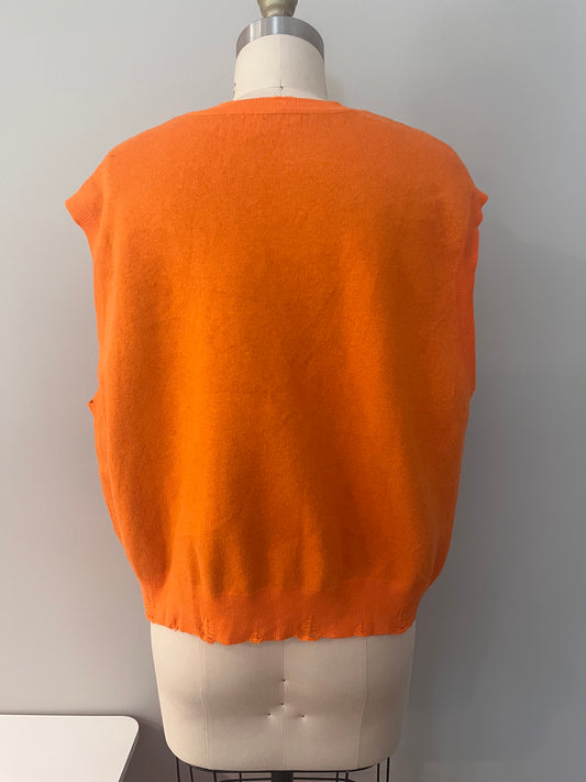 Orange knit vest with ribbed trim